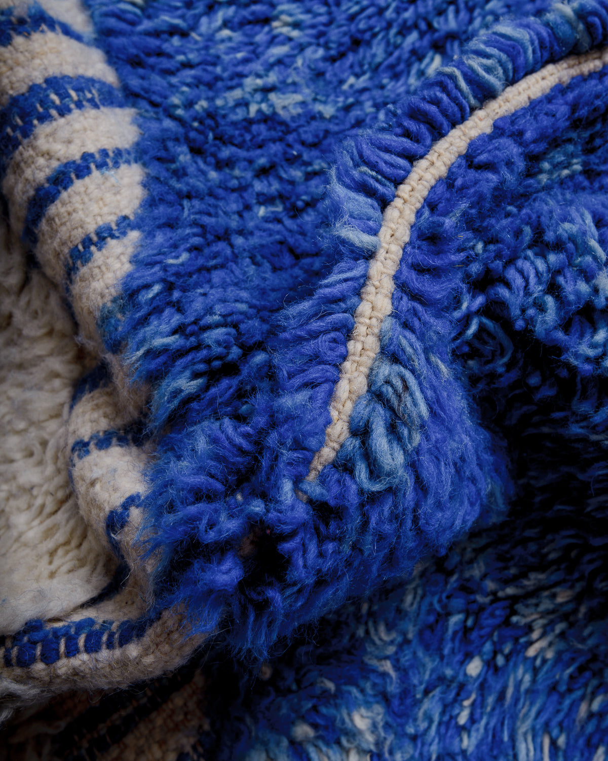 Detail of wool texture of Berberlin beniourain rug.